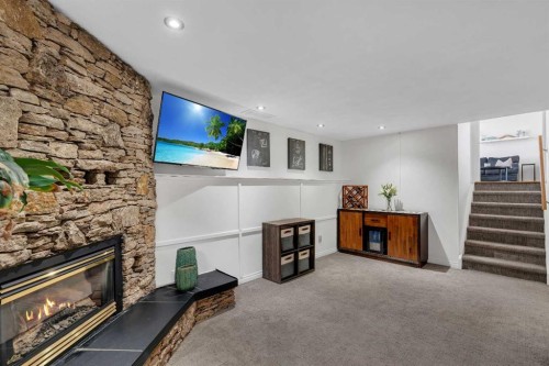 9939 Maplecreek Drive Se, Calgary, AB - Indoor With Fireplace