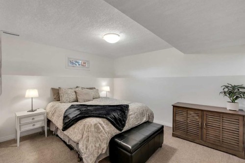 9939 Maplecreek Drive Se, Calgary, AB - Indoor Photo Showing Bedroom