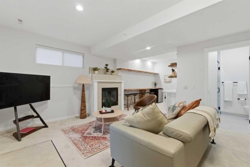 146 Springbluff Heights Sw, Calgary, AB - Indoor With Fireplace