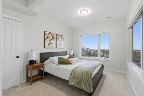 146 Springbluff Heights Sw, Calgary, AB - Indoor Photo Showing Bedroom