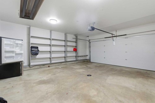 146 Springbluff Heights Sw, Calgary, AB - Indoor Photo Showing Garage