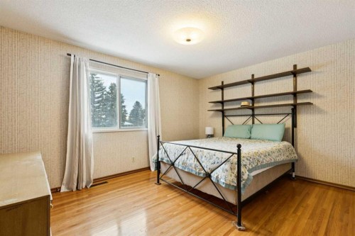7312 Kananaskis Drive Sw, Calgary, AB - Indoor Photo Showing Bedroom