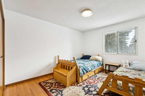 7312 Kananaskis Drive Sw, Calgary, AB - Indoor Photo Showing Bedroom