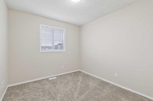 475 Cimarron Boulevard, Okotoks, AB - Indoor Photo Showing Other Room