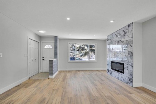 363 Templeside Circle Ne, Calgary, AB - Indoor With Fireplace
