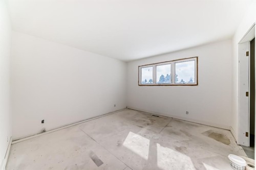 251 Cannell Place Sw, Calgary, AB - Indoor Photo Showing Other Room