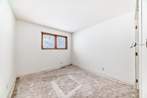 251 Cannell Place Sw, Calgary, AB - Indoor Photo Showing Other Room