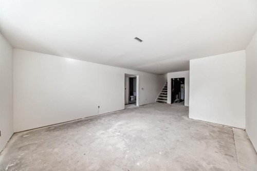 251 Cannell Place Sw, Calgary, AB - Indoor Photo Showing Other Room