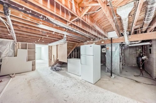 251 Cannell Place Sw, Calgary, AB - Indoor Photo Showing Basement