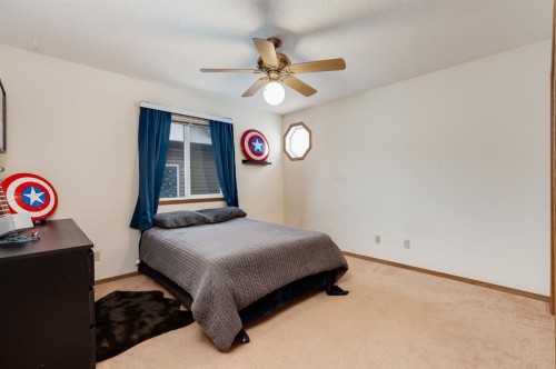 45 Thornfield Close Se, Airdrie, AB - Indoor Photo Showing Bedroom