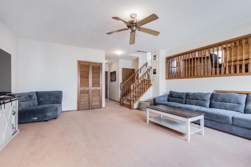 45 Thornfield Close Se, Airdrie, AB - Indoor Photo Showing Living Room