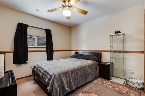 45 Thornfield Close Se, Airdrie, AB - Indoor Photo Showing Bedroom