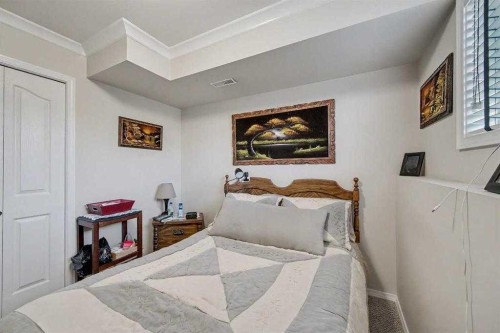1409 Strathcona Way, Strathmore, AB - Indoor Photo Showing Bedroom