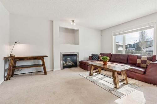 85 Silverado Range View Sw, Calgary, AB - Indoor Photo Showing Living Room With Fireplace