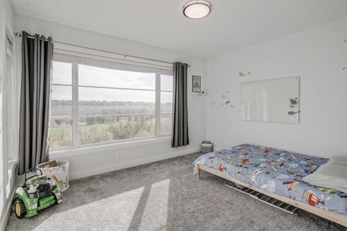 701 13A Street Ne, Calgary, AB - Indoor Photo Showing Bedroom