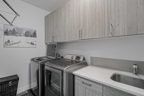 701 13A Street Ne, Calgary, AB - Indoor Photo Showing Laundry Room