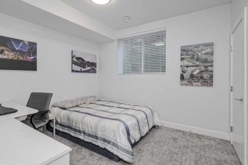 701 13A Street Ne, Calgary, AB - Indoor Photo Showing Bedroom