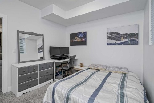 701 13A Street Ne, Calgary, AB - Indoor Photo Showing Bedroom