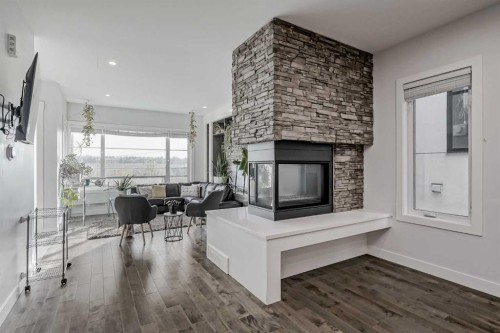 701 13A Street Ne, Calgary, AB - Indoor With Fireplace