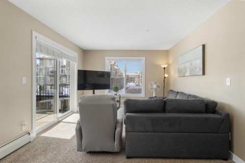 1237-81 Legacy Boulevard Se, Calgary, AB - Indoor Photo Showing Living Room