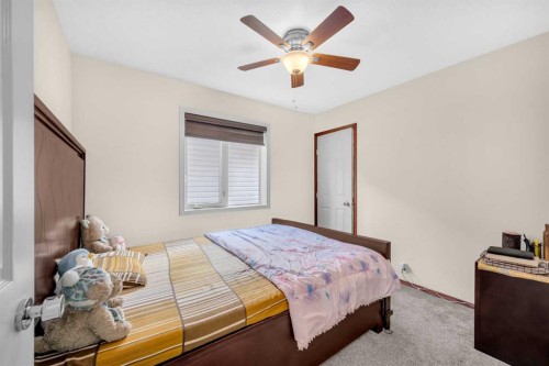 51 Coral Reef Close Ne, Calgary, AB - Indoor Photo Showing Bedroom