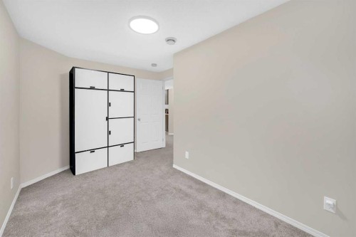 51 Coral Reef Close Ne, Calgary, AB - Indoor Photo Showing Other Room
