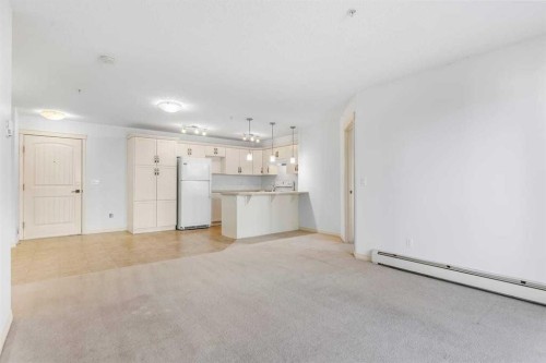 2303-175 Panatella Hill Nw, Calgary, AB - Indoor Photo Showing Kitchen