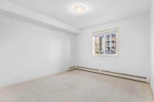 2303-175 Panatella Hill Nw, Calgary, AB - Indoor Photo Showing Other Room