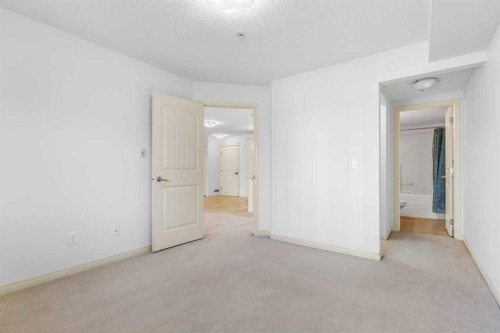 2303-175 Panatella Hill Nw, Calgary, AB - Indoor Photo Showing Other Room