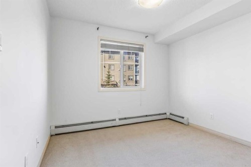 2303-175 Panatella Hill Nw, Calgary, AB - Indoor Photo Showing Other Room