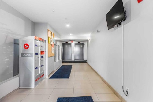 2303-175 Panatella Hill Nw, Calgary, AB - Indoor Photo Showing Other Room