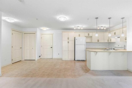 2303-175 Panatella Hill Nw, Calgary, AB - Indoor Photo Showing Kitchen
