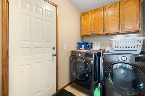 80 Chaparral Road Se, Calgary, AB - Indoor Photo Showing Laundry Room