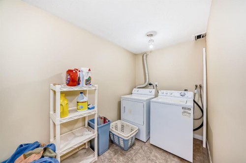 247 Bracewood Road Sw, Calgary, AB - Indoor Photo Showing Laundry Room