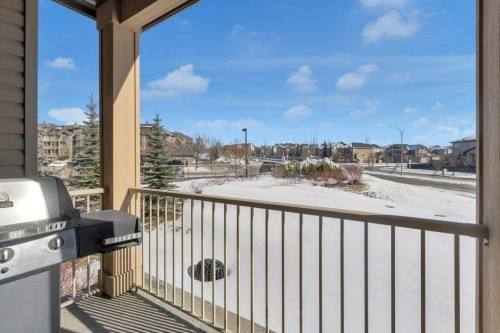 207-207 Sunset Drive, Cochrane, AB - Outdoor With Exterior
