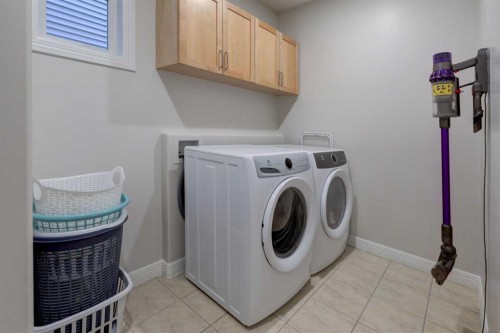 57 Discovery Ridge Hill Sw, Calgary, AB - Indoor Photo Showing Laundry Room