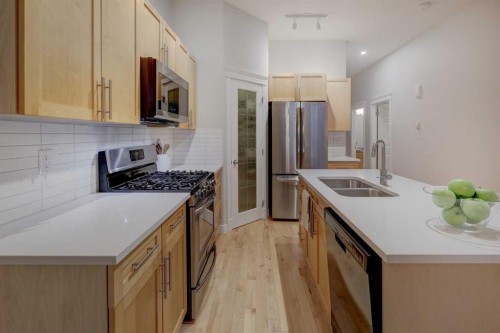 57 Discovery Ridge Hill Sw, Calgary, AB - Indoor Photo Showing Kitchen With Double Sink With Upgraded Kitchen