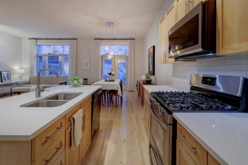 57 Discovery Ridge Hill Sw, Calgary, AB - Indoor Photo Showing Kitchen With Double Sink
