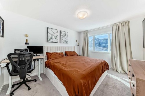 455 Tekarra Drive Nw, Calgary, AB - Indoor Photo Showing Bedroom