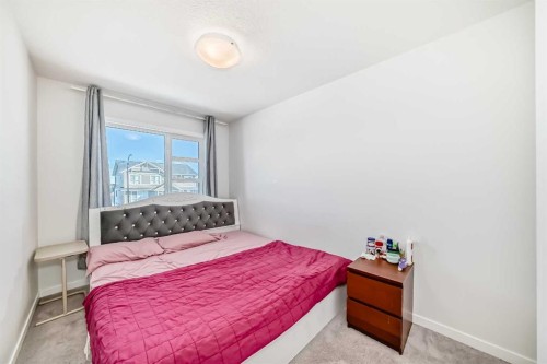 455 Tekarra Drive Nw, Calgary, AB - Indoor Photo Showing Bedroom