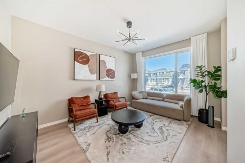 455 Tekarra Drive Nw, Calgary, AB - Indoor Photo Showing Living Room
