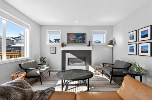 23 Willow Park Point, Cochrane, AB - Indoor Photo Showing Living Room With Fireplace