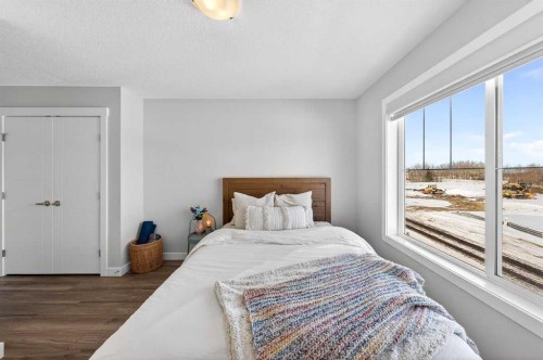 23 Willow Park Point, Cochrane, AB - Indoor Photo Showing Bedroom