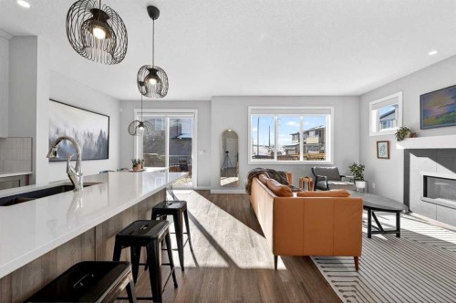 23 Willow Park Point, Cochrane, AB - Indoor With Fireplace