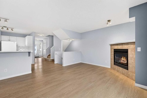 11 Chaparral Ridge Terrace Se, Calgary, AB - Indoor With Fireplace