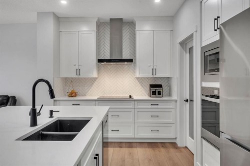 3608 Cornerstone Boulevard Ne, Calgary, AB - Indoor Photo Showing Kitchen With Double Sink With Upgraded Kitchen