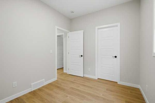 9 Bayview Mews Sw, Airdrie, AB - Indoor Photo Showing Other Room
