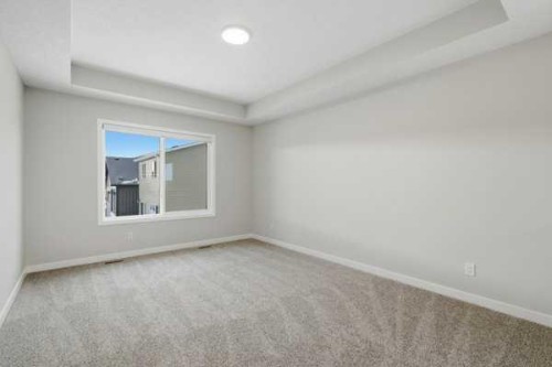 9 Bayview Mews Sw, Airdrie, AB - Indoor Photo Showing Other Room