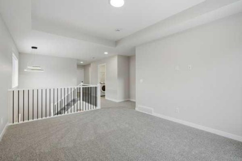 9 Bayview Mews Sw, Airdrie, AB - Indoor Photo Showing Other Room