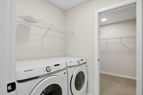 9 Bayview Mews Sw, Airdrie, AB - Indoor Photo Showing Laundry Room